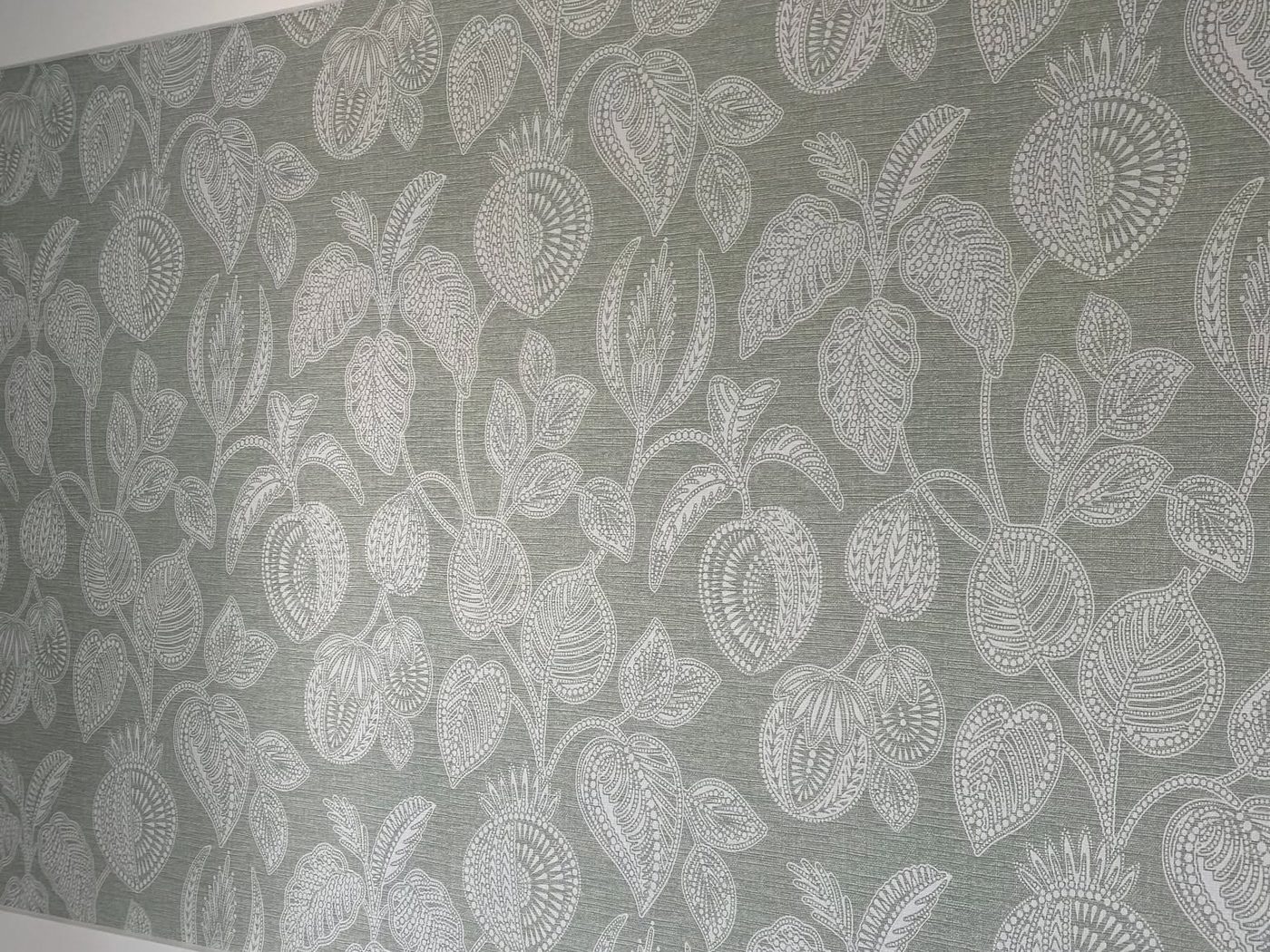 Wallpaper hanging in Ayr: patterned paper finished to white panelling